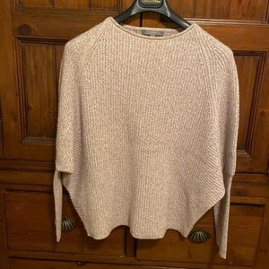 Beautiful cashmere sweater has a metallic rose gold threading